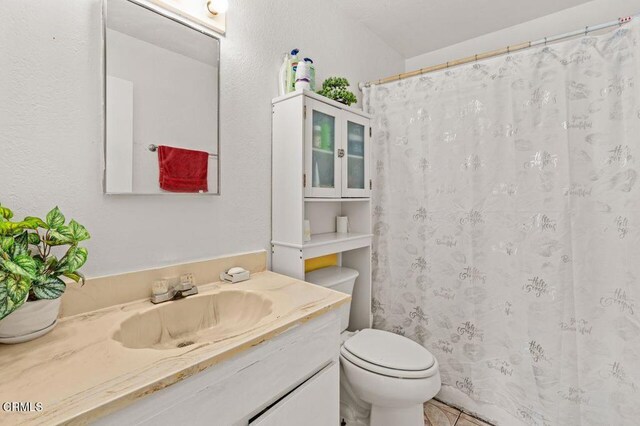 1431 Casa San Carlos Ln Unit A, Oxnard, CA 93033 - bathroom with vanity, tile patterned floors, and a shower with shower curtain