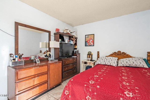 1431 Casa San Carlos Ln Unit A, Oxnard, CA 93033 - bedroom featuring light tile patterned flooring