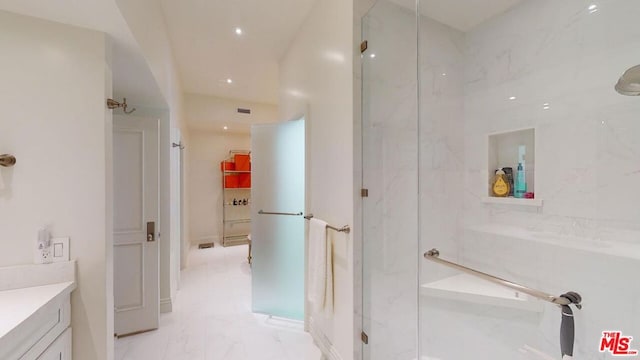 bathroom featuring vanity and walk in shower