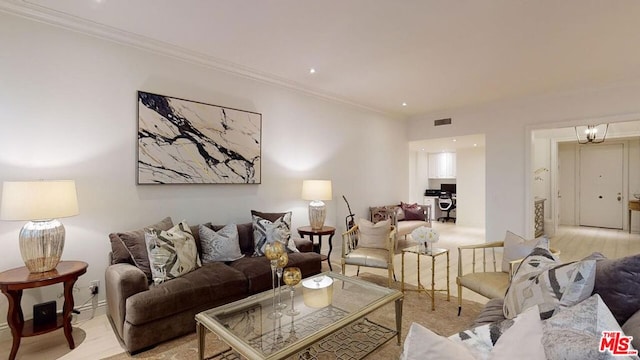 living room featuring crown molding and light wood-type flooring