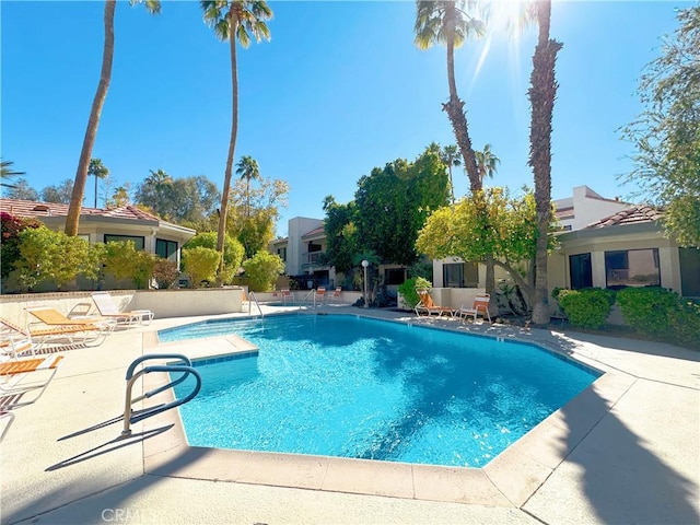 pool with a patio area