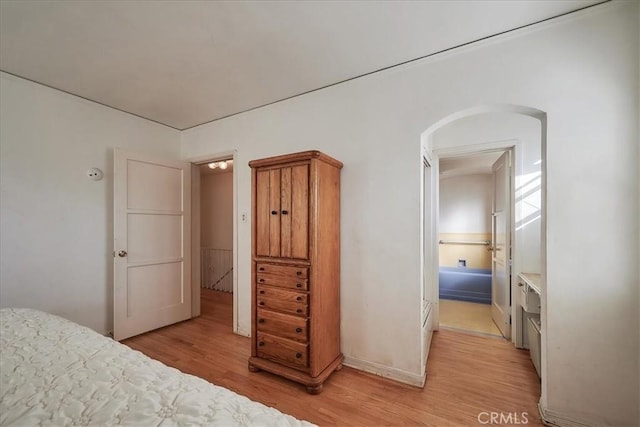 bedroom featuring light wood-type flooring