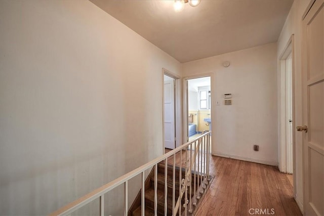 hallway featuring hardwood / wood-style floors