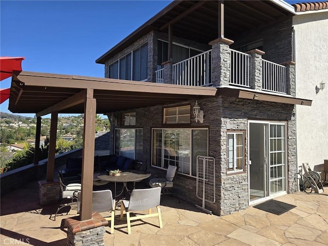 view of patio / terrace featuring a balcony