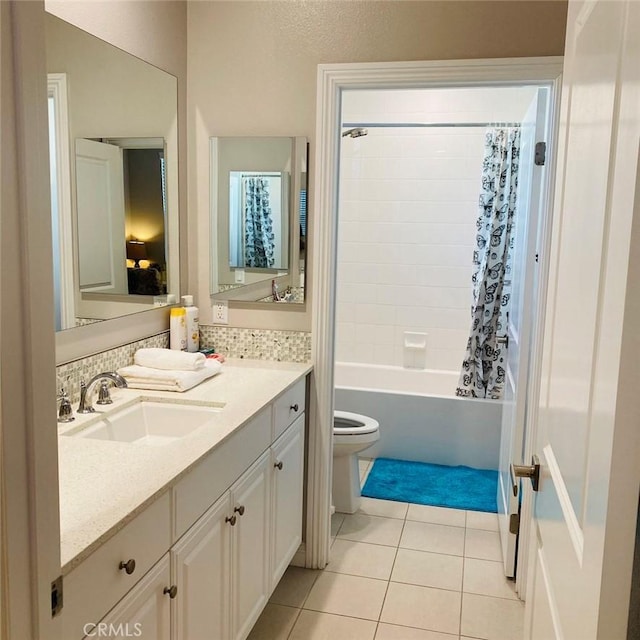 full bathroom with tile patterned flooring, vanity, shower / bath combination with curtain, and toilet