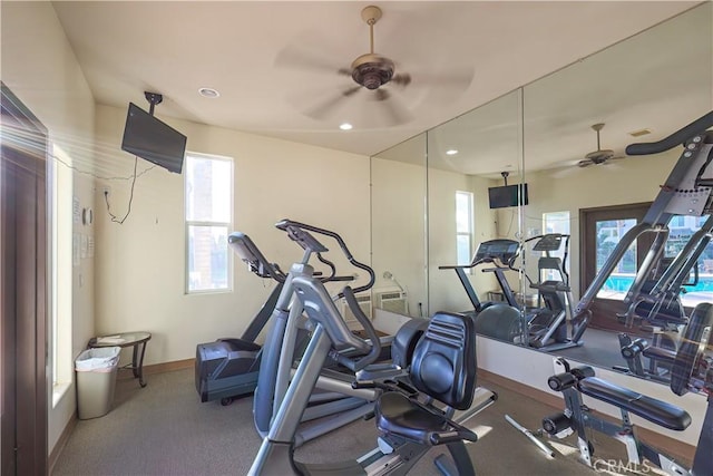 workout area with plenty of natural light and ceiling fan