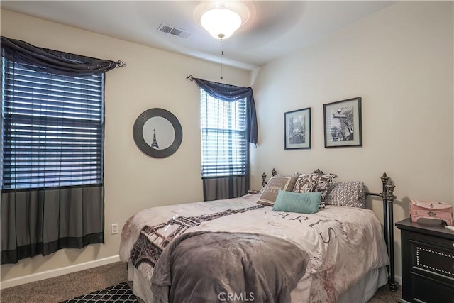 bedroom featuring ceiling fan and carpet floors