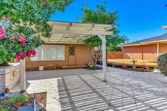 view of patio featuring a pergola