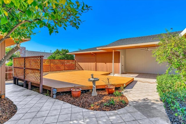 exterior space featuring a deck and a patio