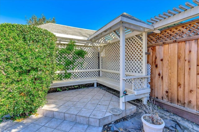 view of patio featuring a pergola