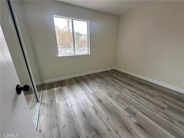 empty room with light wood-type flooring