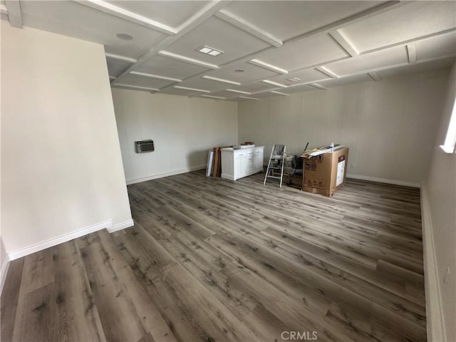 spare room with dark wood-type flooring and coffered ceiling