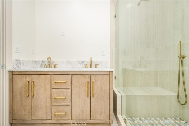 bathroom featuring a shower and vanity