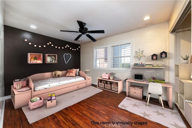 interior space with ceiling fan and dark wood-type flooring