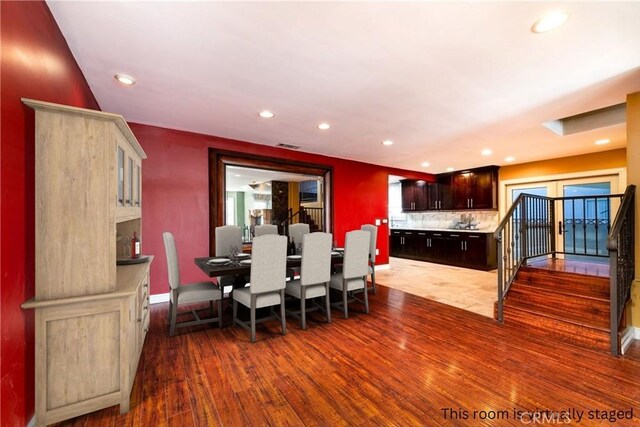 dining room featuring dark hardwood / wood-style flooring