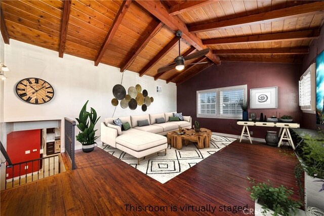 living room featuring vaulted ceiling with beams, wood-type flooring, plenty of natural light, and wooden ceiling