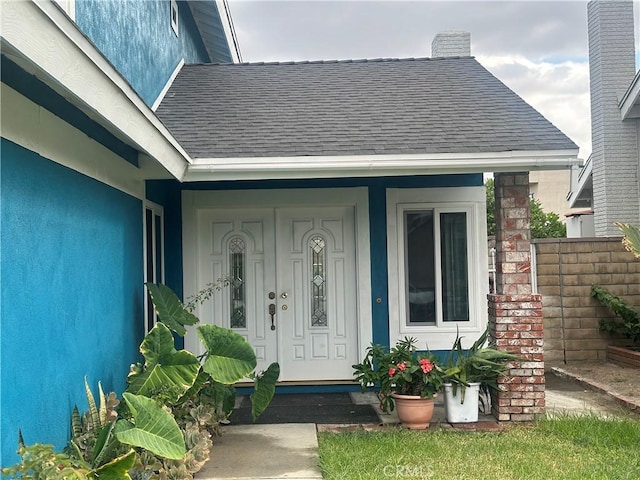 property entrance featuring covered porch