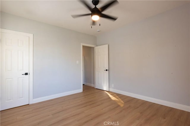 interior space with ceiling fan and light wood-type flooring