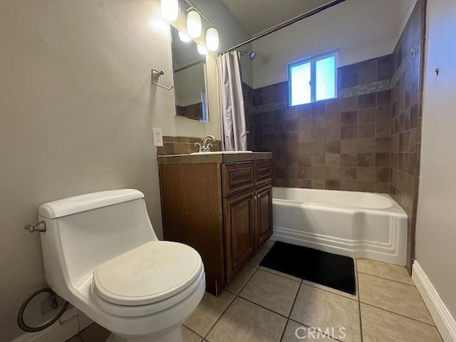 full bathroom featuring tile patterned floors, shower / bath combination with curtain, toilet, and vanity