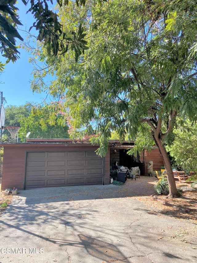 view of front of house with an outbuilding