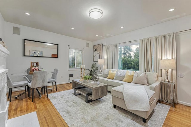 living room featuring hardwood / wood-style flooring and a wealth of natural light