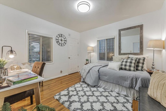 bedroom featuring wood-type flooring