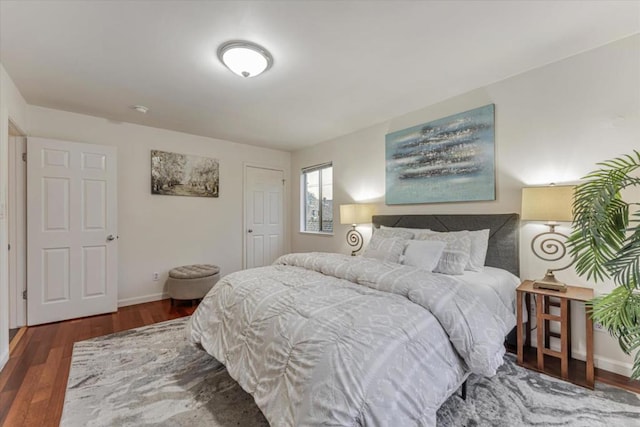 bedroom featuring dark hardwood / wood-style floors