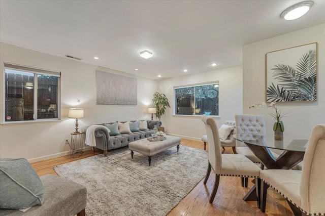 living room with light hardwood / wood-style floors