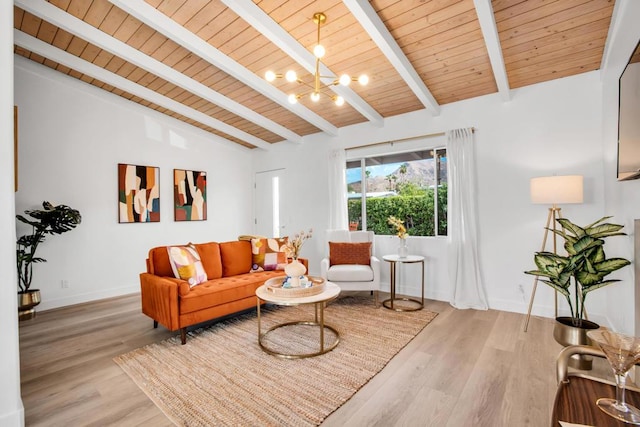 living room featuring vaulted ceiling with beams, a chandelier, light hardwood / wood-style flooring, and wooden ceiling