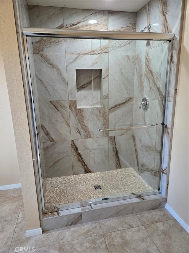 19345 Oneida Rd, Apple Valley, CA 92307 - bathroom with baseboards and a stall shower