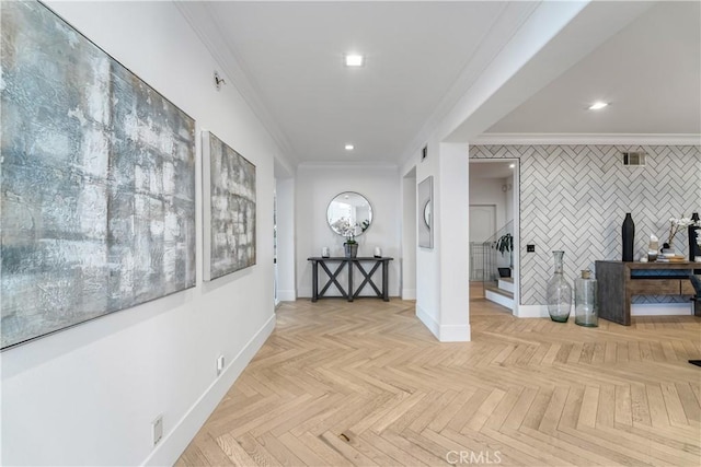 hall with crown molding, tile walls, and light parquet flooring