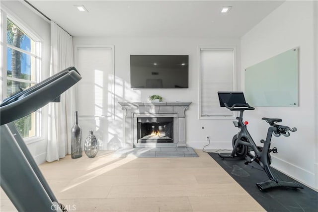 workout room featuring a wealth of natural light