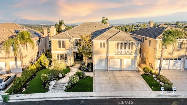 view of front of home with a garage