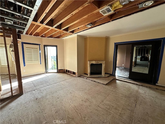 unfurnished living room featuring a fireplace