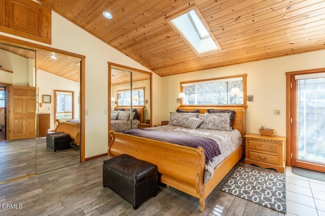 bedroom featuring wood-type flooring, multiple windows, and wood ceiling