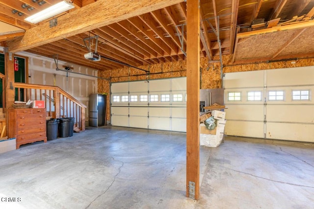 garage featuring a garage door opener