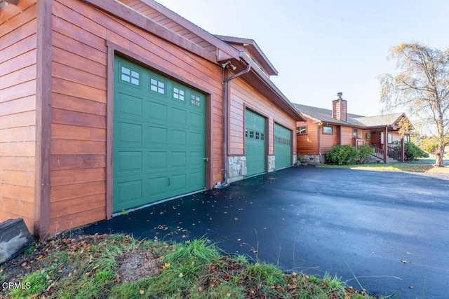 view of home's exterior with a garage