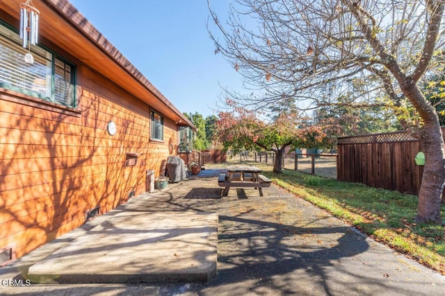 exterior space with a fenced backyard