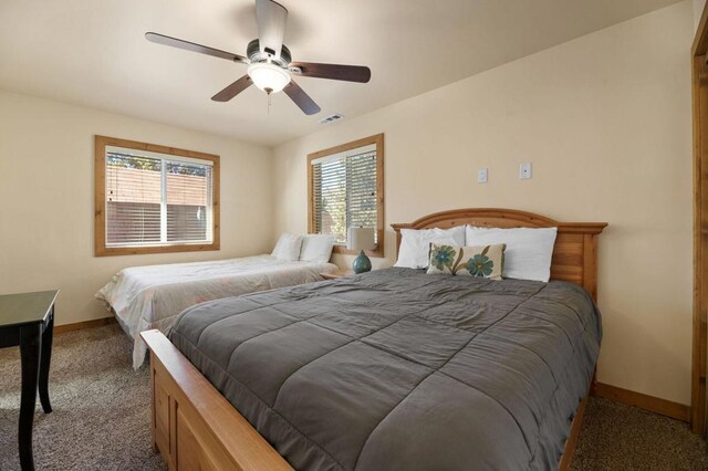 bedroom with carpet flooring and ceiling fan