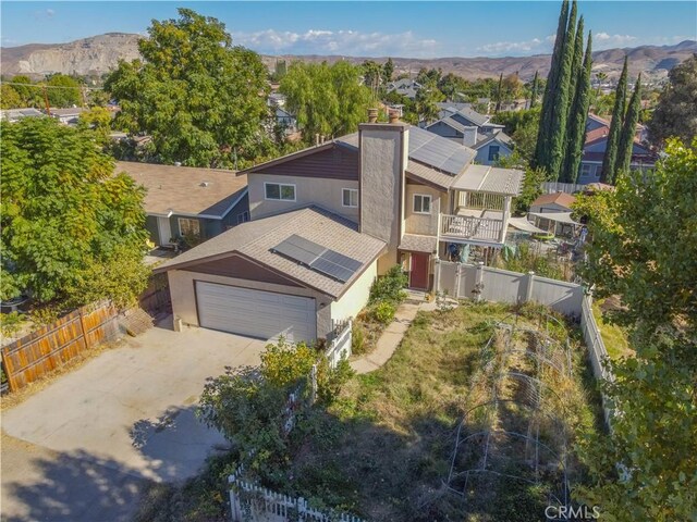 drone / aerial view featuring a mountain view