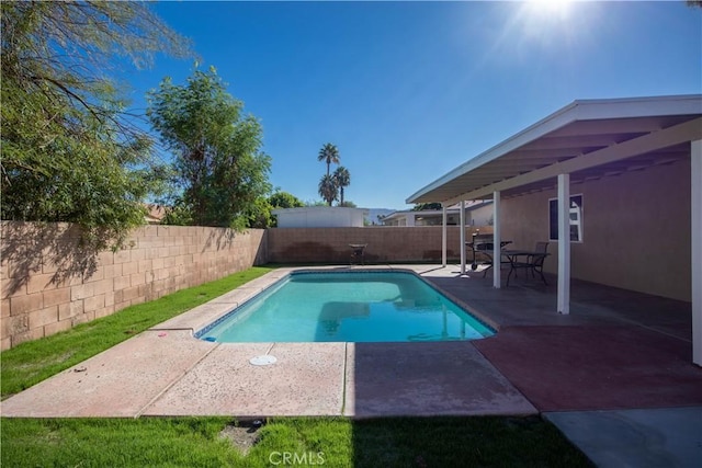 view of pool featuring a patio area