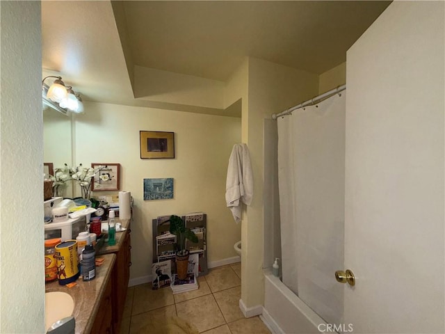 full bathroom featuring tile patterned flooring, vanity, shower / bath combo, and toilet