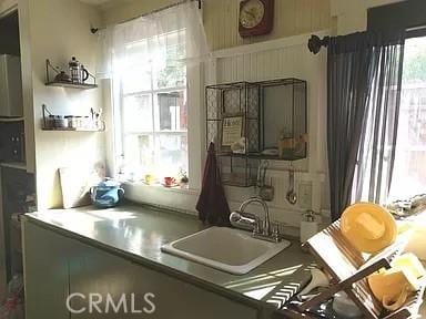 kitchen with plenty of natural light and sink