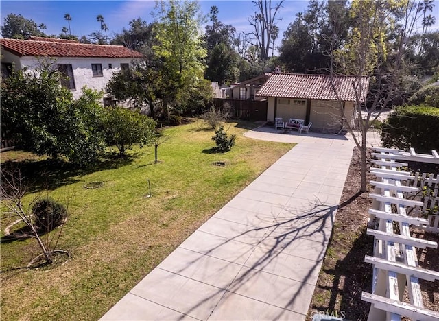 view of community featuring a lawn