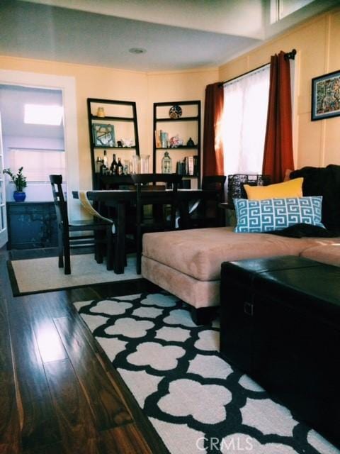 living room with wood-type flooring