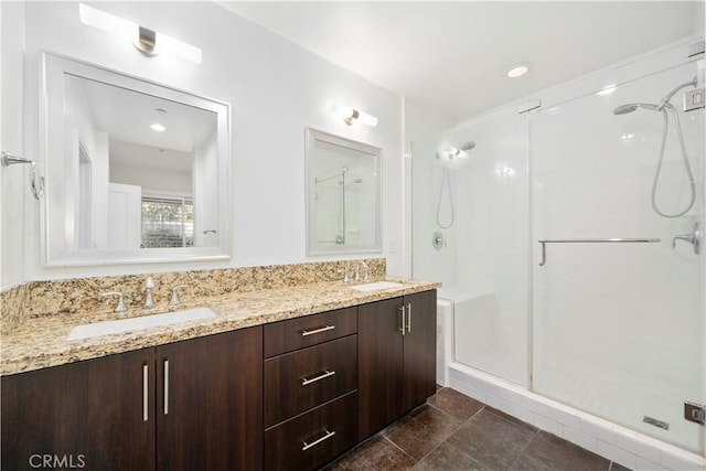 bathroom featuring vanity and walk in shower