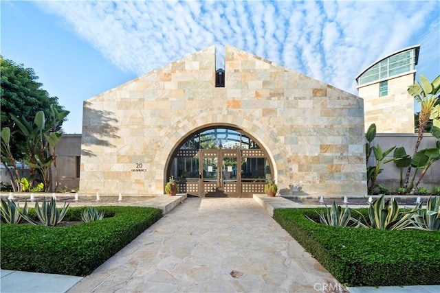 property entrance featuring french doors