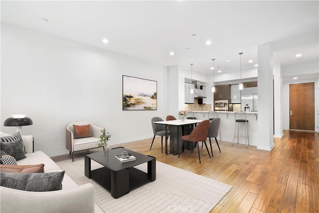 living room featuring light hardwood / wood-style flooring