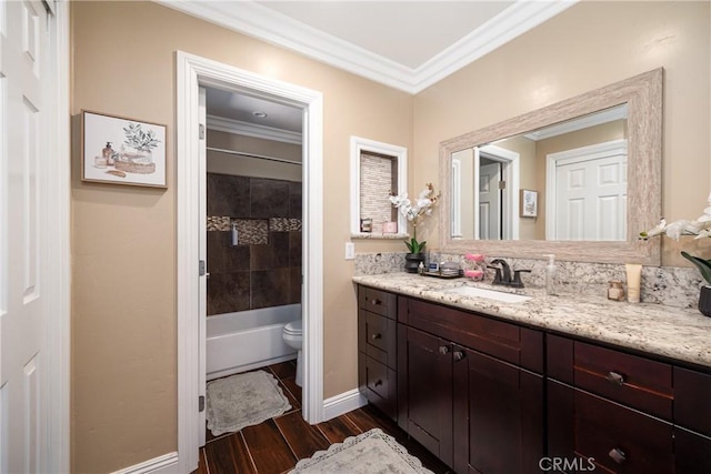 full bathroom with vanity, bathing tub / shower combination, toilet, ornamental molding, and wood-type flooring