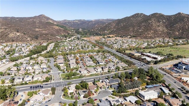 drone / aerial view featuring a mountain view